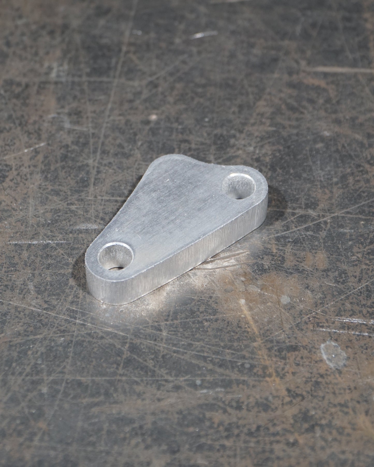 SHAPE MATCHED MECHANICAL BRAKE SPACER