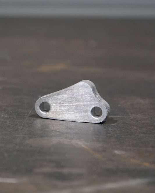 SHAPE MATCHED MECHANICAL BRAKE SPACER