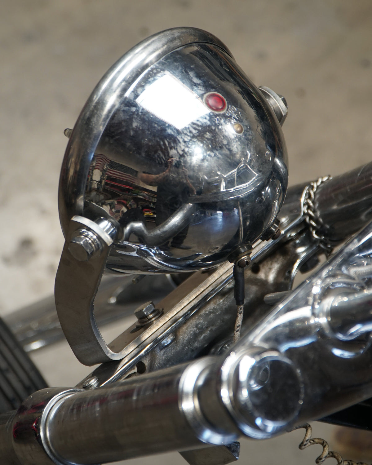 SIDE MOUNT HEADLIGHT BRACKET FOR BATES