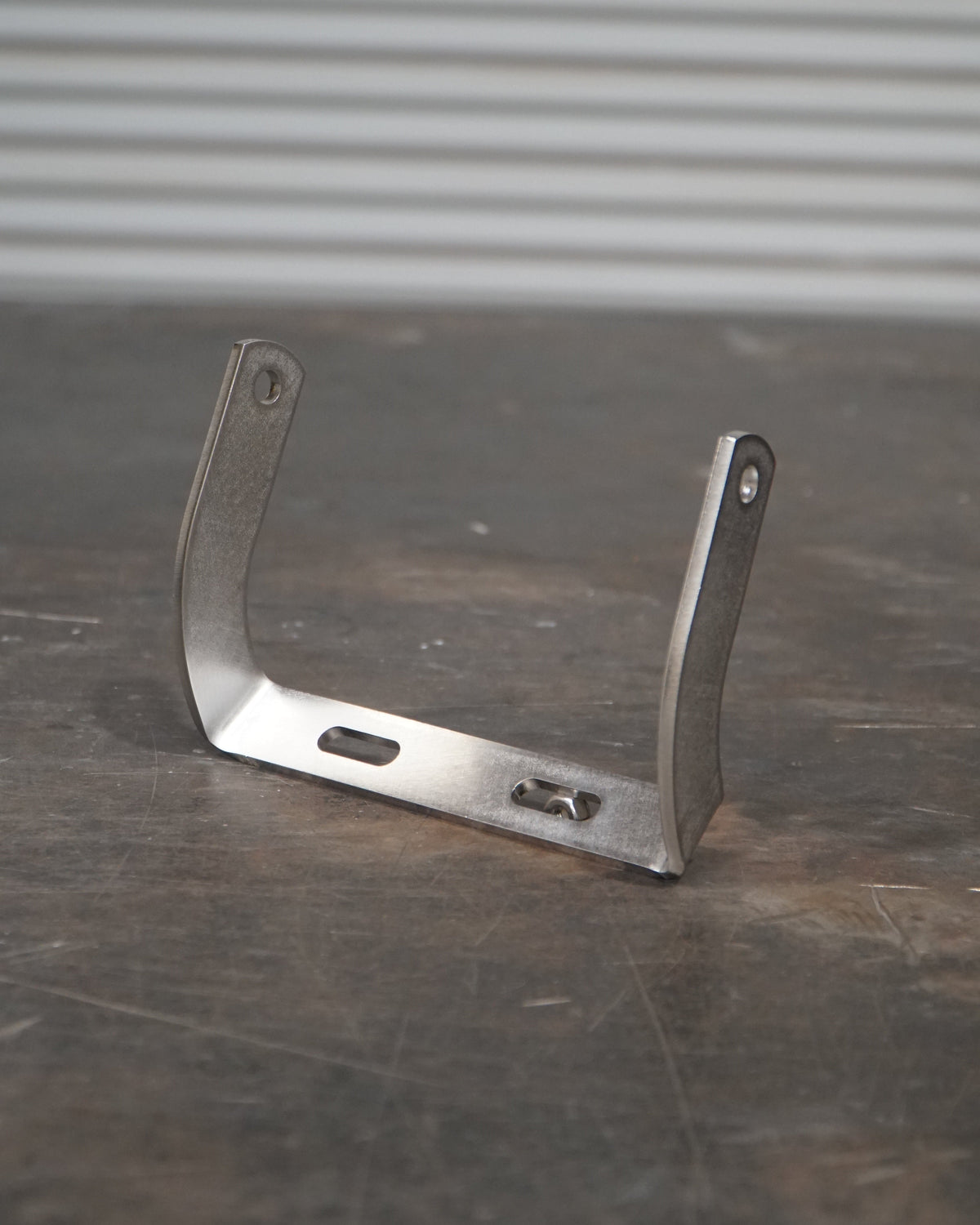 SIDE MOUNT HEADLIGHT BRACKET FOR BATES