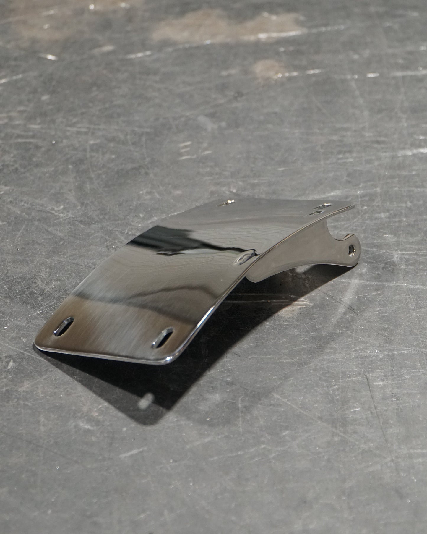 PRIMARY SIDE LICENSE PLATE MOUNT